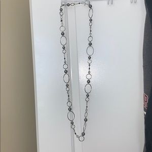Long beaded necklace and matching earrings